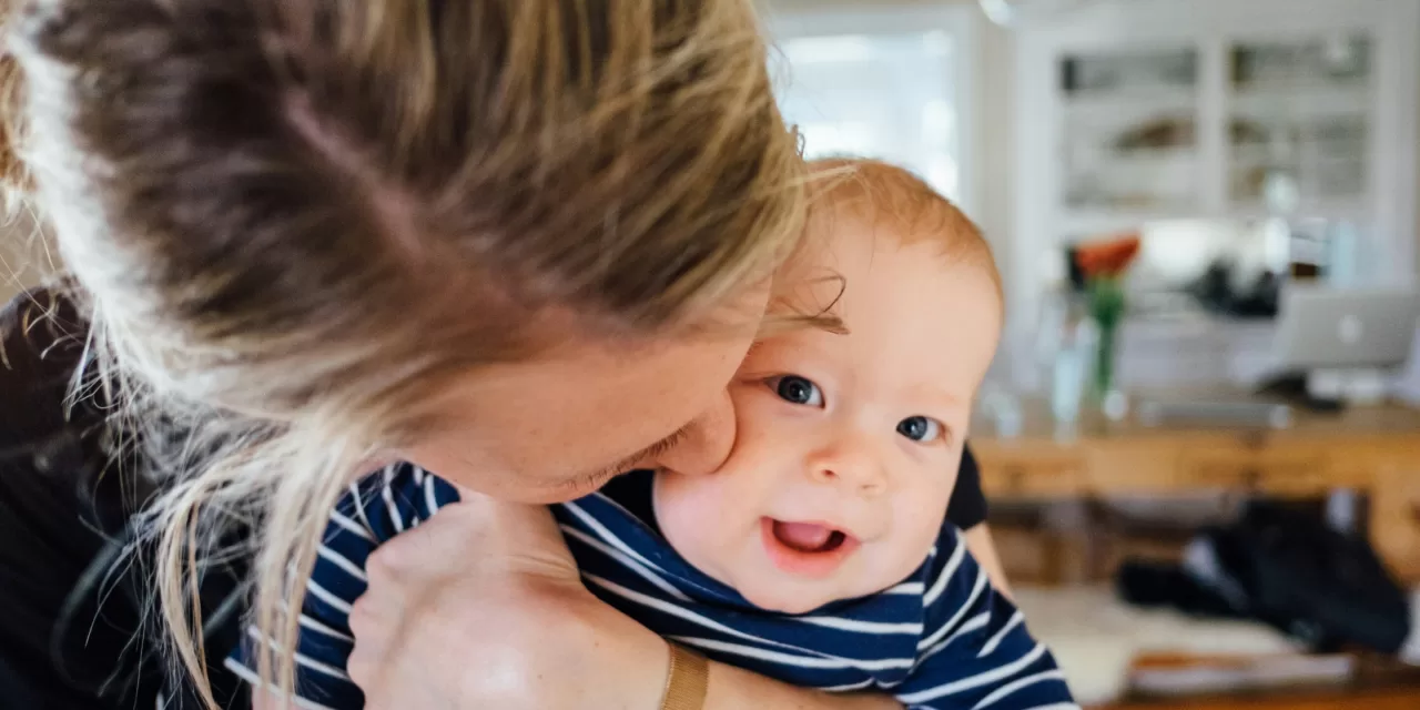 Why You Should Never Kiss a Baby, According to a Clinical Microbiologist